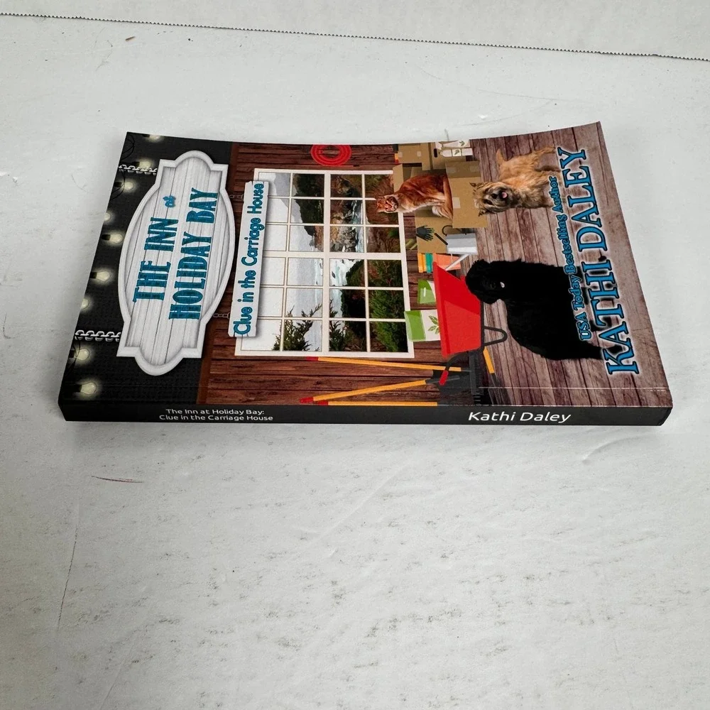 The Inn at Holiday Bay Kathi Daley 2023‎ Clue in the Carriage House Cozy Mystery
